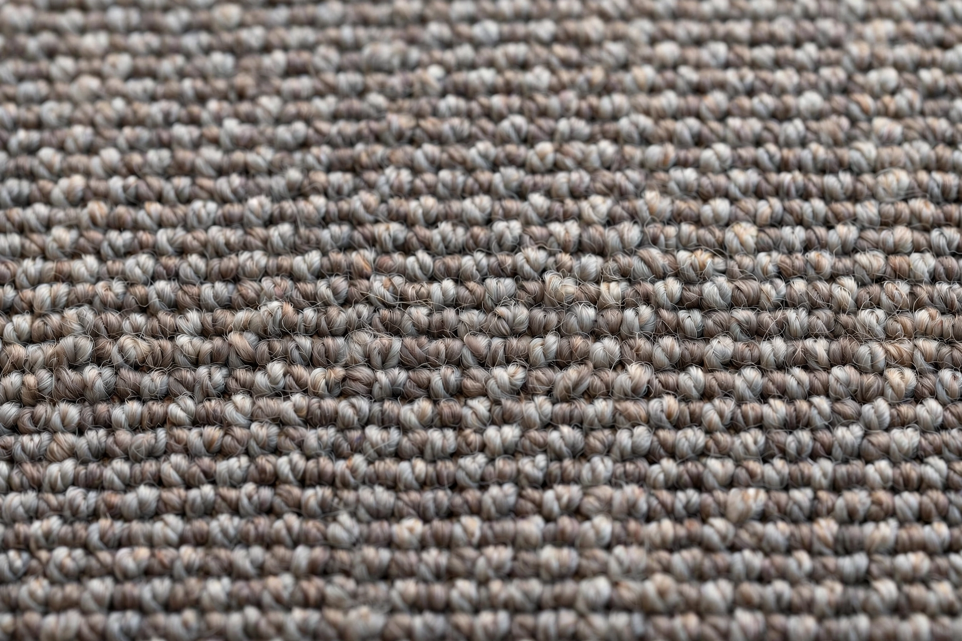 close up of multi toned berber loop pile carpet texture