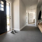 hallway and entryway with durable low pile carpet for high traffic