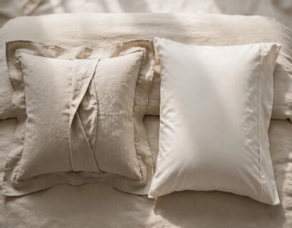 Side-by-side comparison of a bordered pillow sham and a plain pillowcase on a neatly made bed
